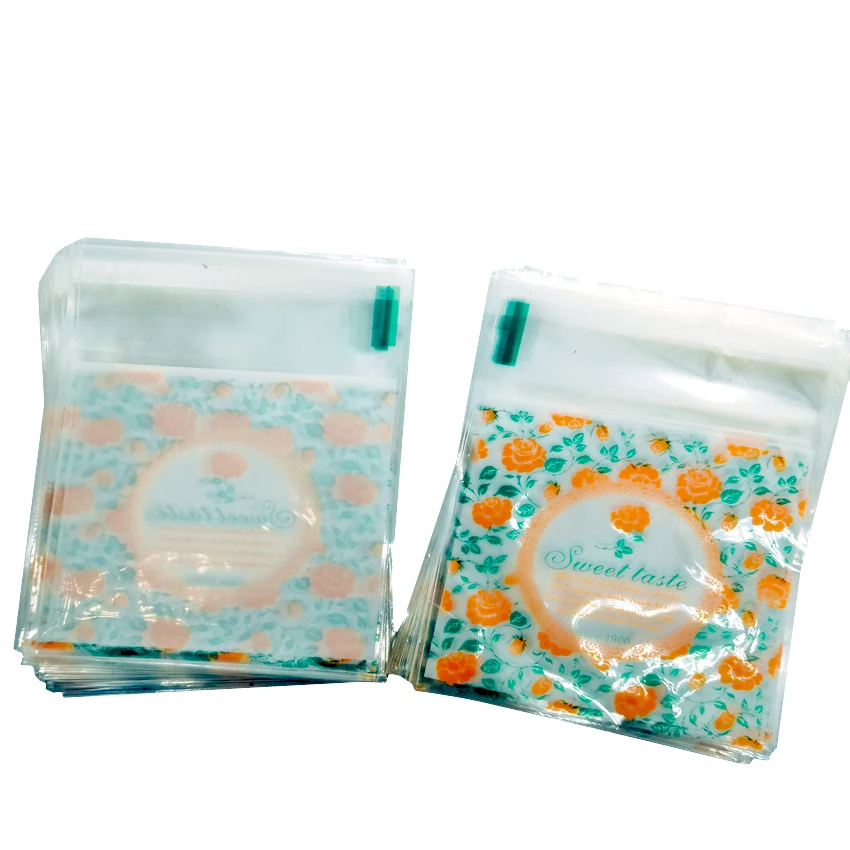 

100pcs/lot 7*7cm Lovely Sweet taste Flower Transparent Self-adhesive DIY Gift Food Packing Bag Small Biscuit bag Plastic Bag
