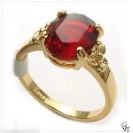 

Very nice! Red Ruby gold plated Lady's ring Size 6-9