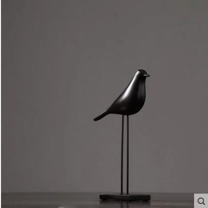 

Резиновая статуэтка птицы