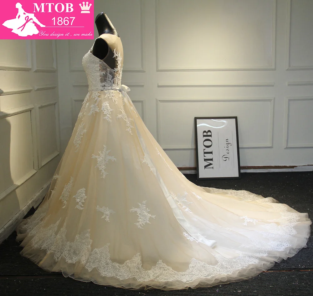 Кружевное свадебное платье трапециевидной формы романтичное без спинки