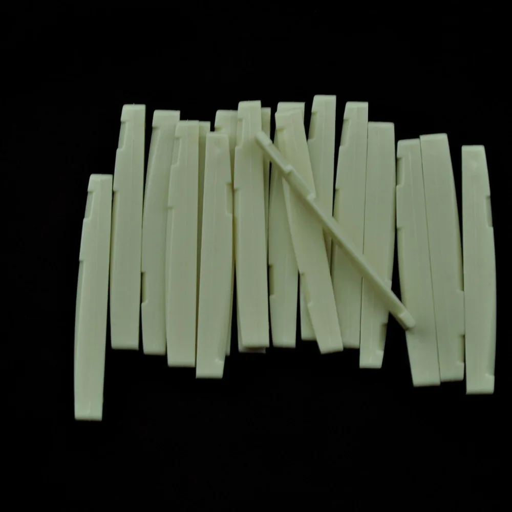 Lots of 50pcs ABS Plastic Acoustic Guitar Compensated Saddles Lower Nuts Beige | Спорт и развлечения