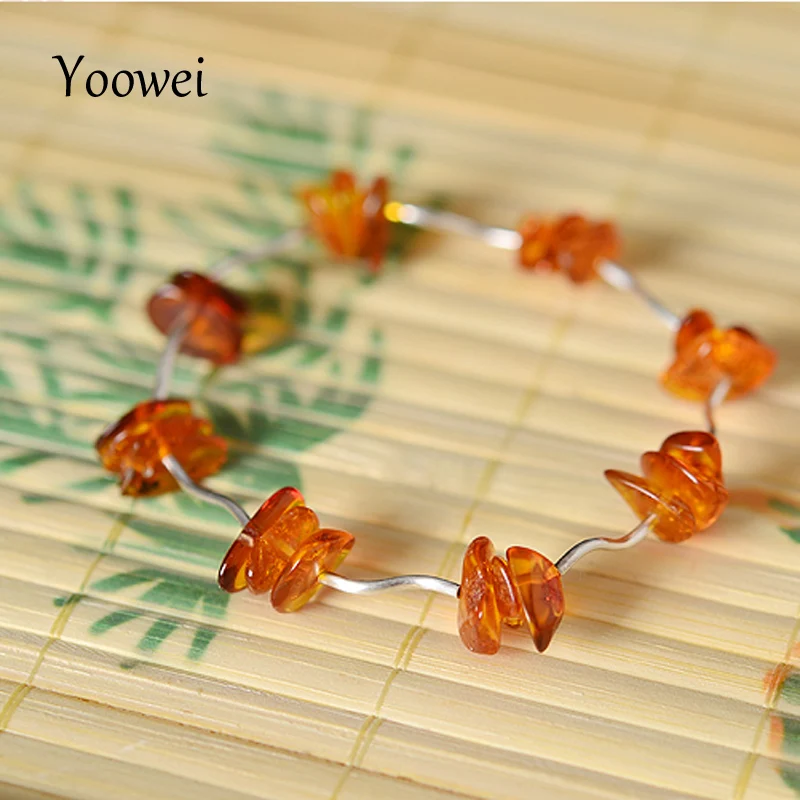 

Yoowei Natural Amber Bracelet Irregular Cognac Beads Elastic Rope Female Models Unique Silver Tube Baltic Amber Jewelry Boutique