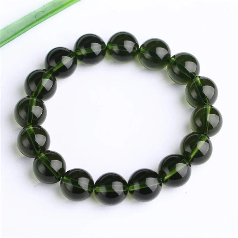 Естественный Moldavite зеленый аэролиты Чешский метеоритов с украшением в виде