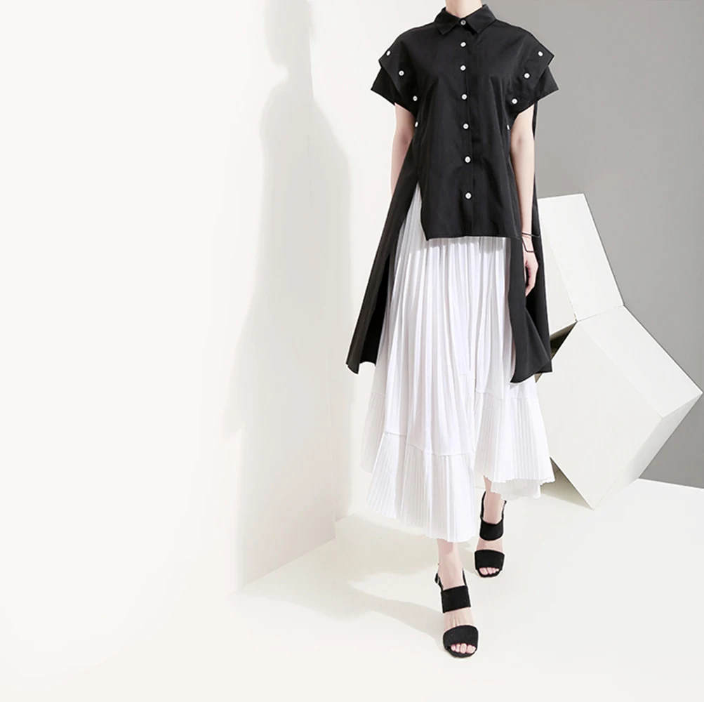 Spring and summer new style Women's sense of design Wild loose short-sleeved shirt Fashion temperament irregular top |