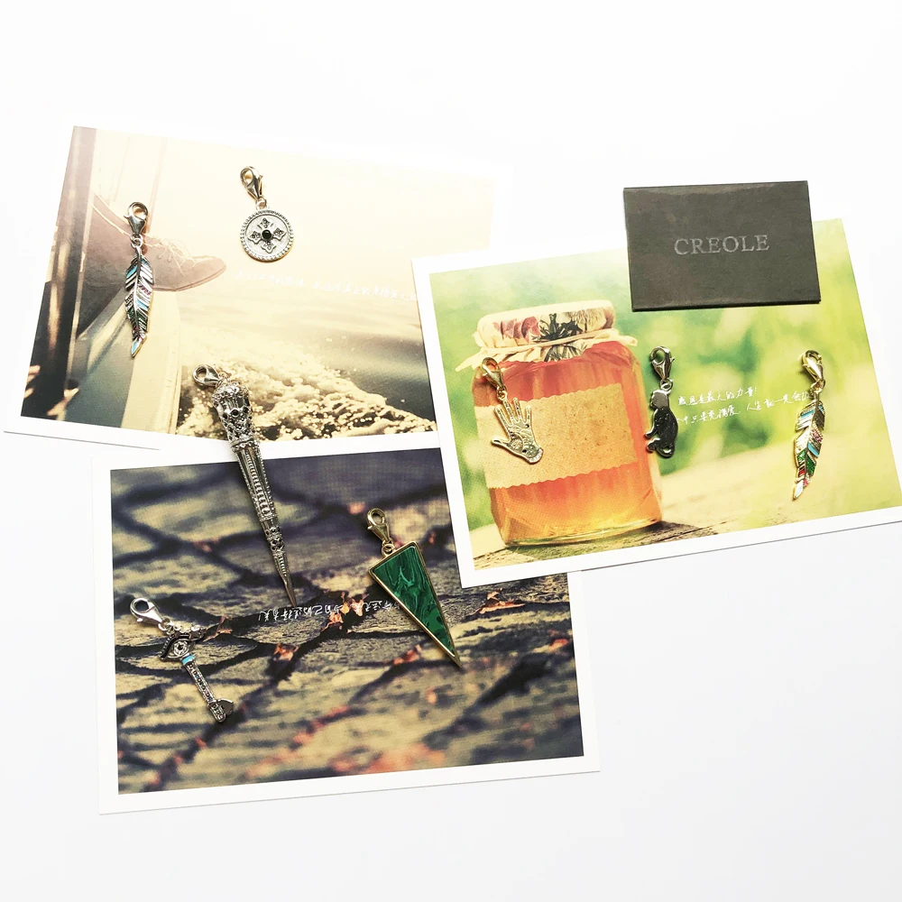 Подвеска в винтажном стиле из серебра 2019 пробы с треугольными перьями котенком