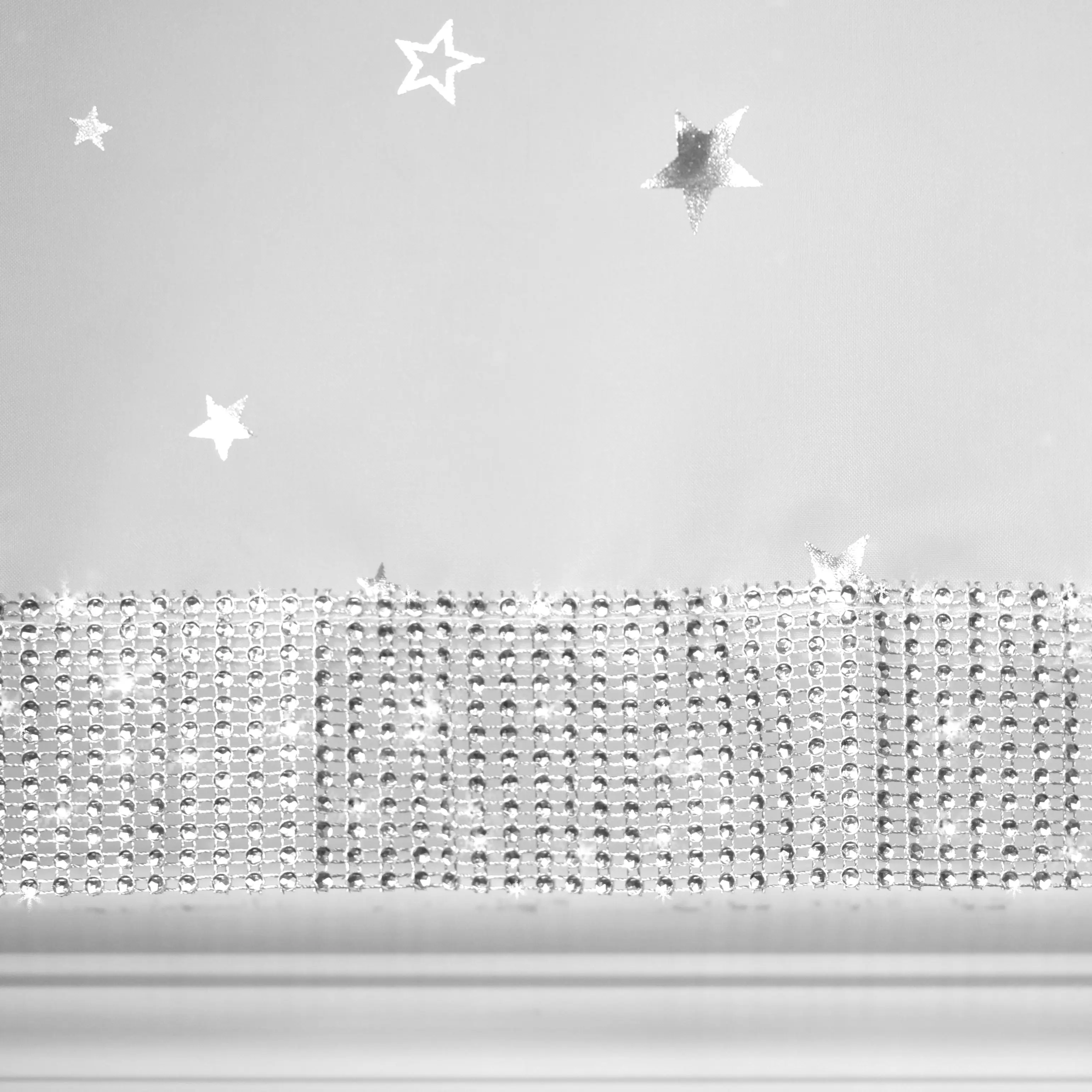 Тюлевая ткань в виде летающей серебряной звезды с блестящими звездами