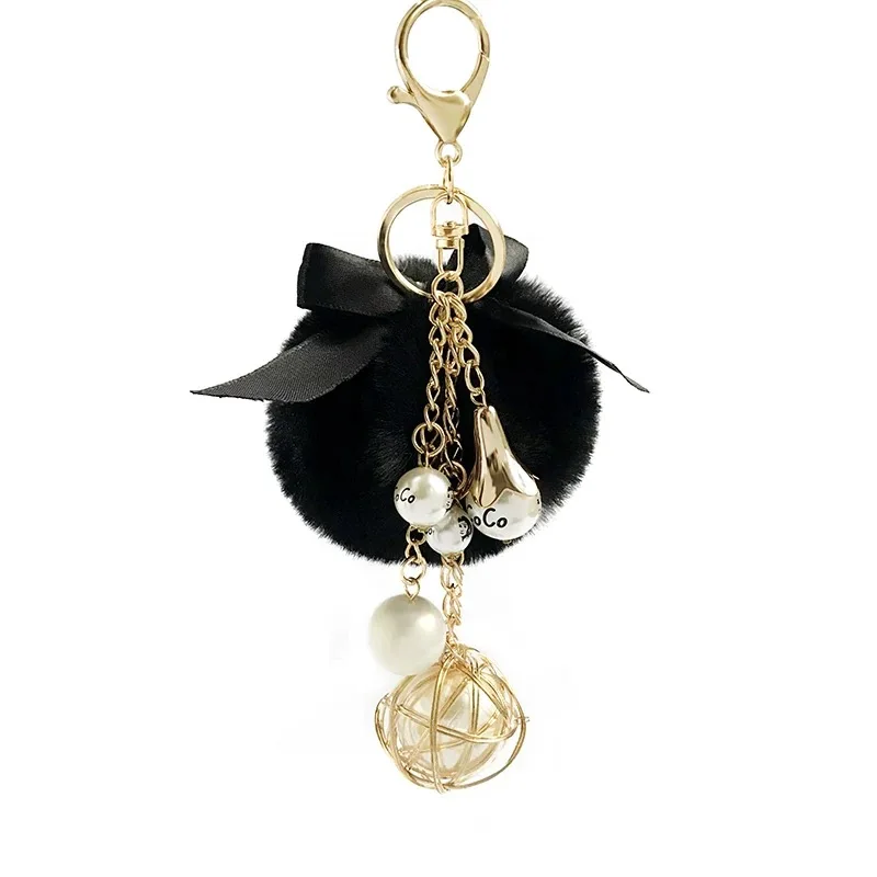 

Cute Bow knot Pompom Keychain FAKE Fur Pom Pom Key chain Car Bag Charm Fur Ball Key Chain Women Key Holder Ring