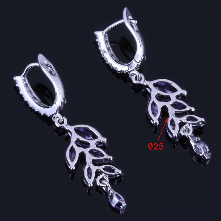 Притягательные серьги с фиолетовым фианитом белые посеребренные висячие V0753 |