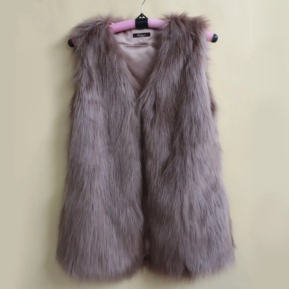 Женский меховой жилет без рукавов черного и белого цвета | Женская одежда