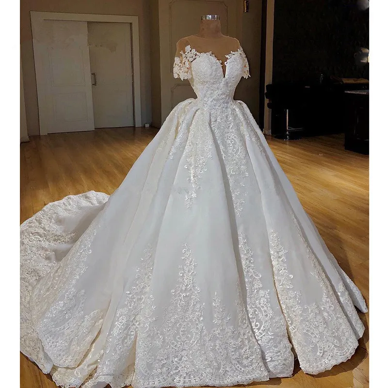 

Vintage Vestido De Noiva Muslim Wedding Dresses Ball Gown Cap Sleeves Lace Beaded Dubai Arabic Wedding Gown Bridal Dresses