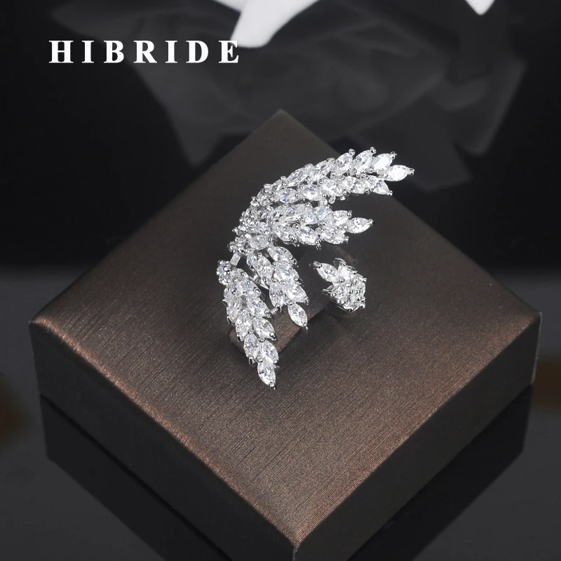 Женское кольцо с фианитом HIBRIDE прозрачное регулируемое на палец белого и
