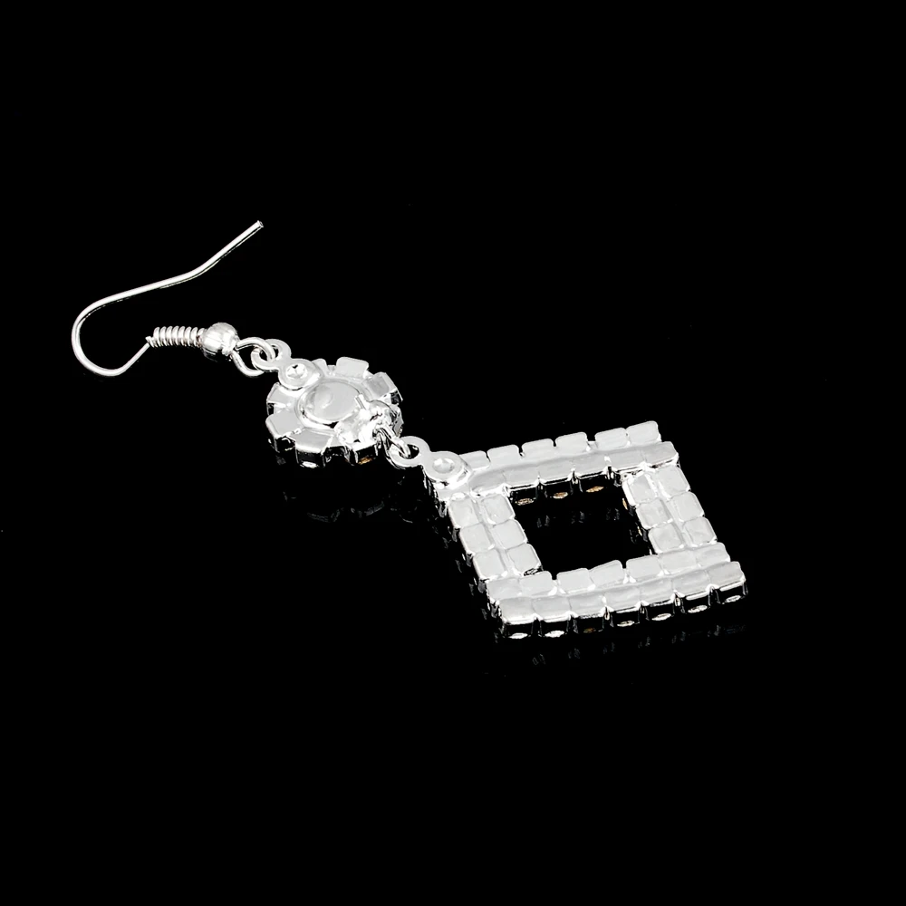 Женские серьги-подвески с кристаллами серебристого цвета | Украшения и