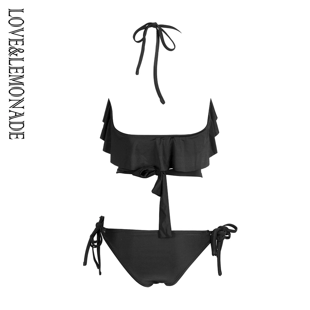 Женское пляжное бикини LOVE & LEMONADE черное с разрезом и украшением модель