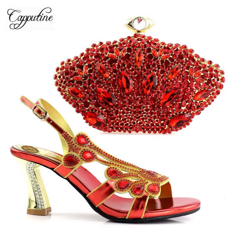 Новейшие синие итальянские туфли и сумки Capputine подходящие к туфлям на высоком