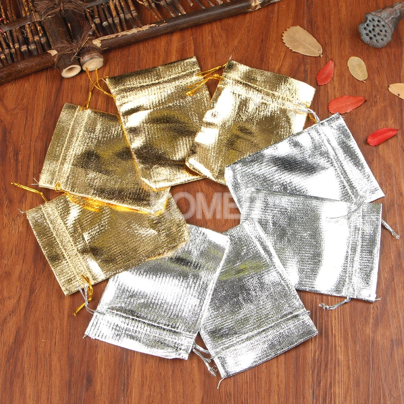 

New Arrival 7x9cm Small Drawstring Jewelry Packaging Bags 100pcs Sliver/Gold Gifts Storage Pouches For Earring Jewelry Packaging