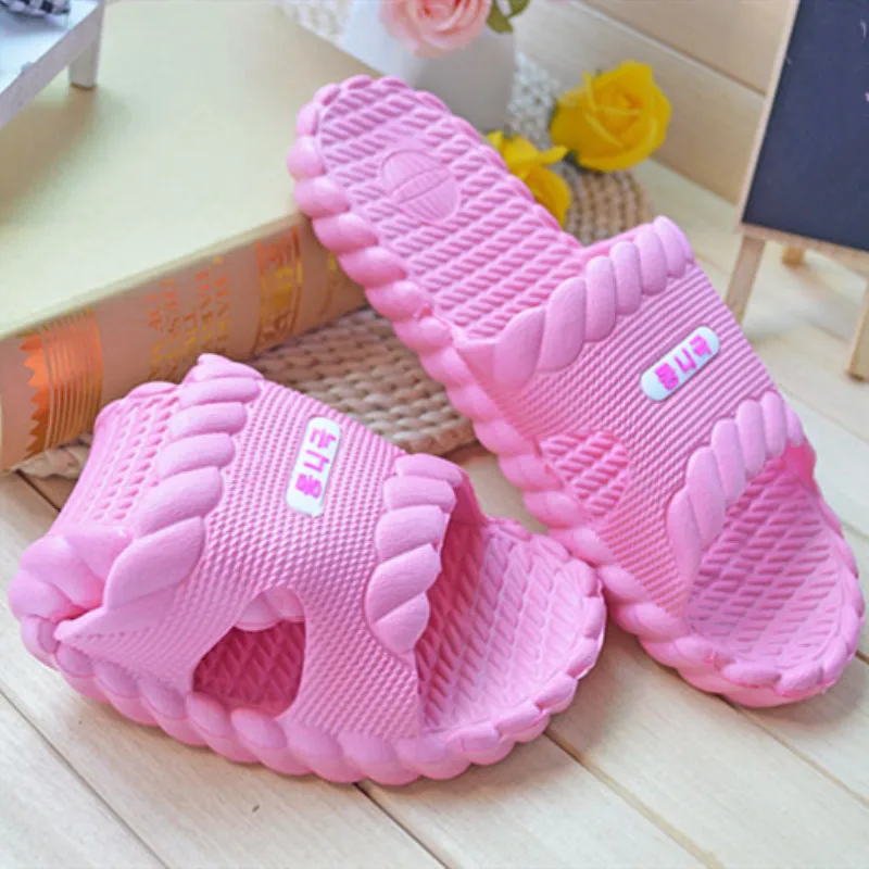 

New Slippers Wholesale Thick Stripe Massage Home Couples Sandals and slippers Women's non-slip bathroom slippers