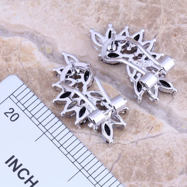 Потрясающие серьги клипсы с черным кубическим цирконием и белым посеребренным