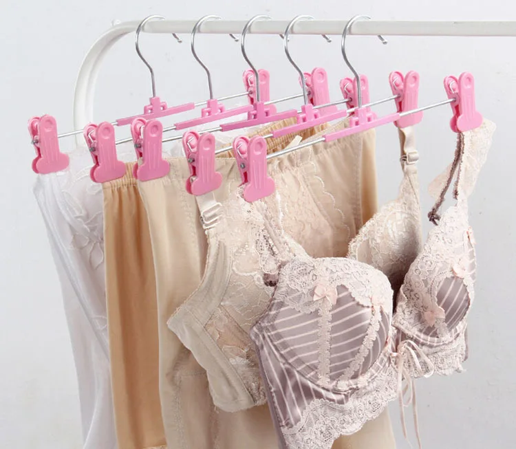 [Бесплатная доставка] розовая пластиковая вешалка с регулируемыми зажимами для