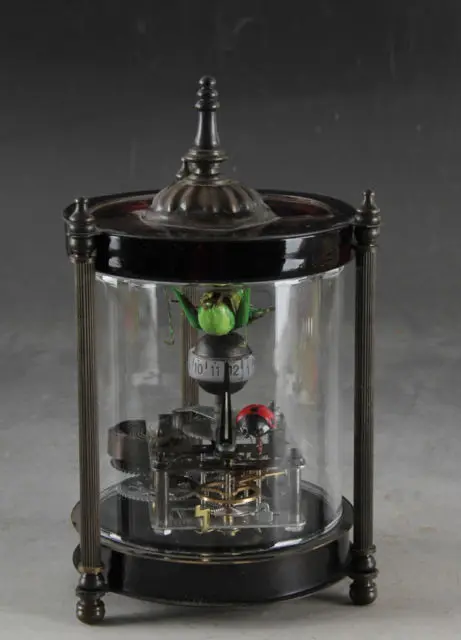 Старые коллекционные декорированные медные механические настольные часы с