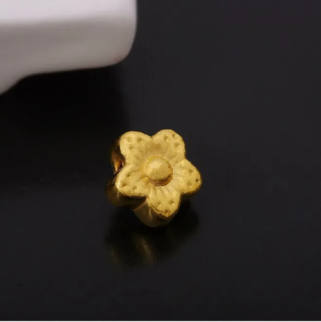 

999 24K Yellow gold Flower Pendant 0.57g