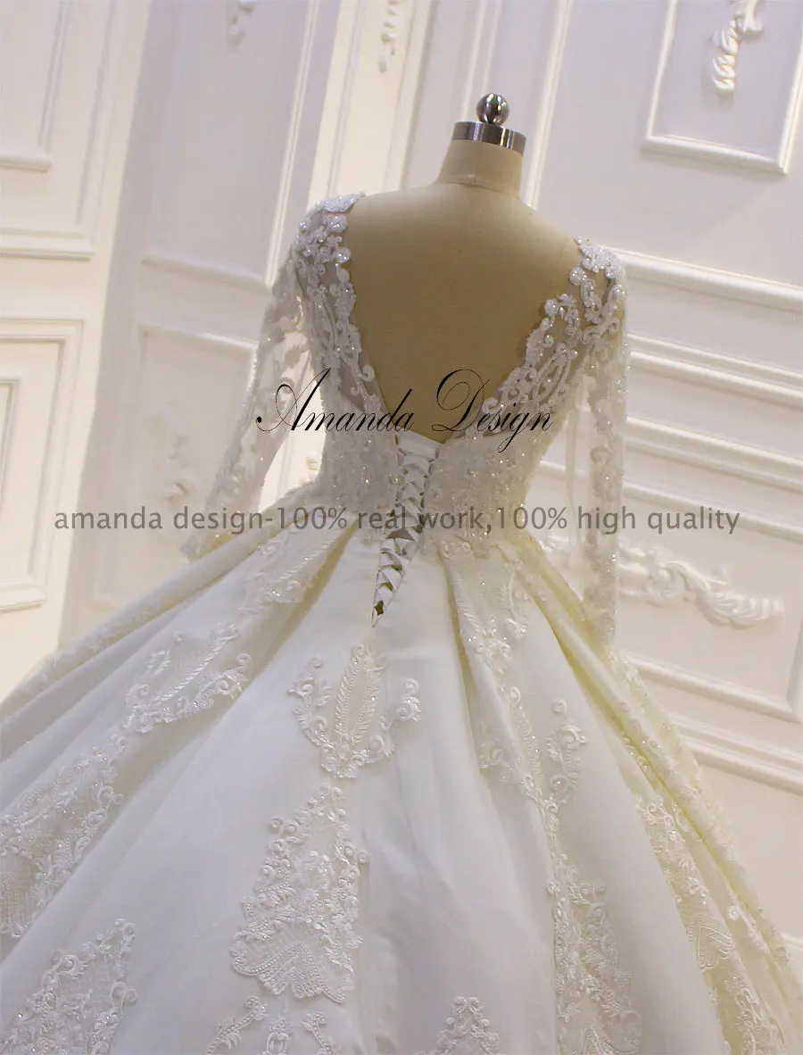 Свадебное платье с длинным рукавом и кружевной аппликацией Amanda Design abito da