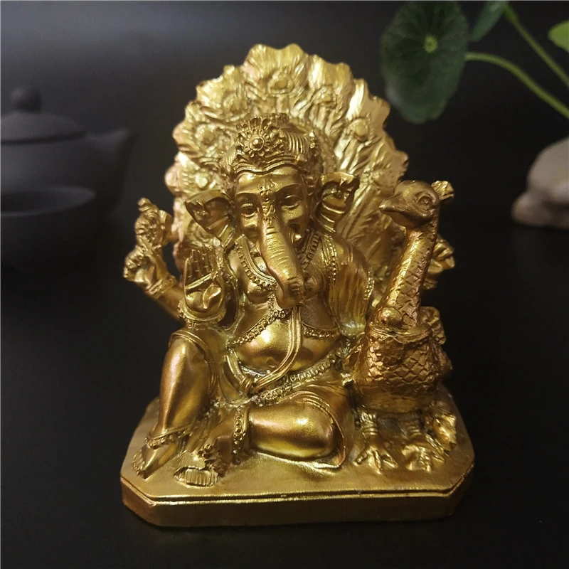 

Golden Lord Ganesha Buddha Statue With Peacock Indian Elephant God Sculptures Home Garden Decoration Buddha Statues Resin Craft