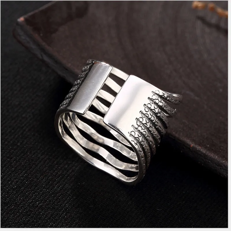 

Uglyless Real 925 Sterling Silver Open Finger Rings Women Vulcanized Black Silver Wide Ring Hollow Handmade Fine Jewelry Bijoux