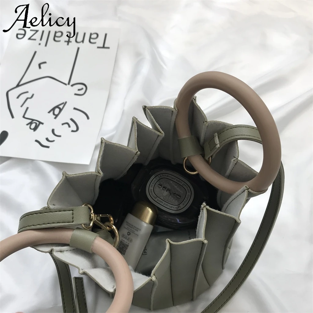 Женская сумка мессенджер Aelicy однотонная кожаная в ретро стиле с карманом для