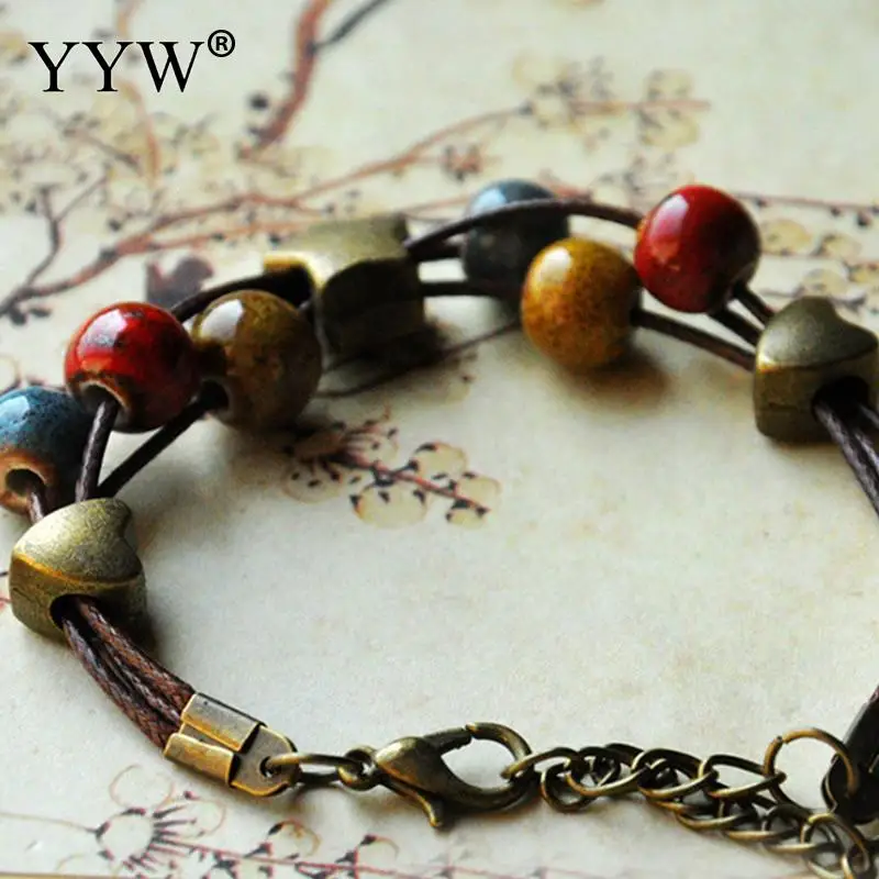 Женский браслет из керамики и бронзы регулируемый ручной работы в этническом
