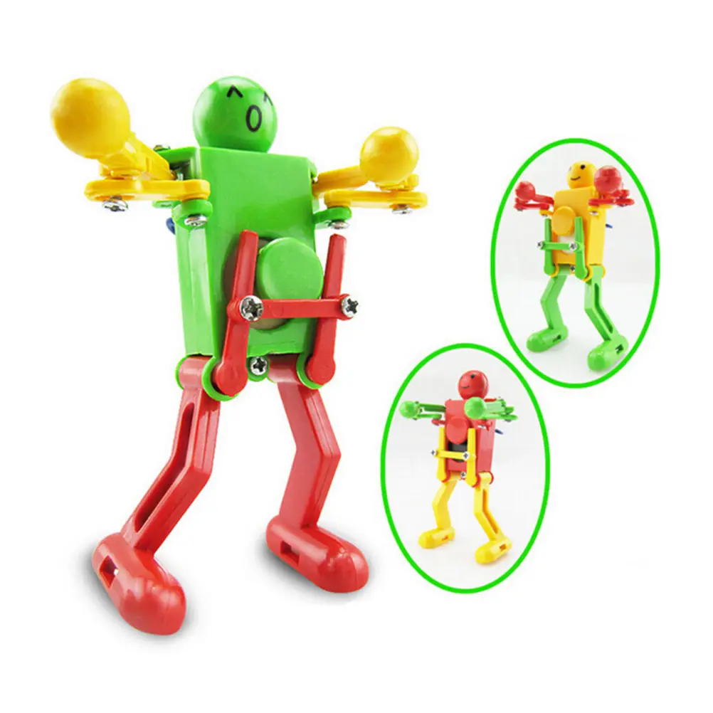 

2Pcs/lot Robot Clockwork Spring Wind Up Toy Dancing Toy for Children Kids Toy Gifts Random color