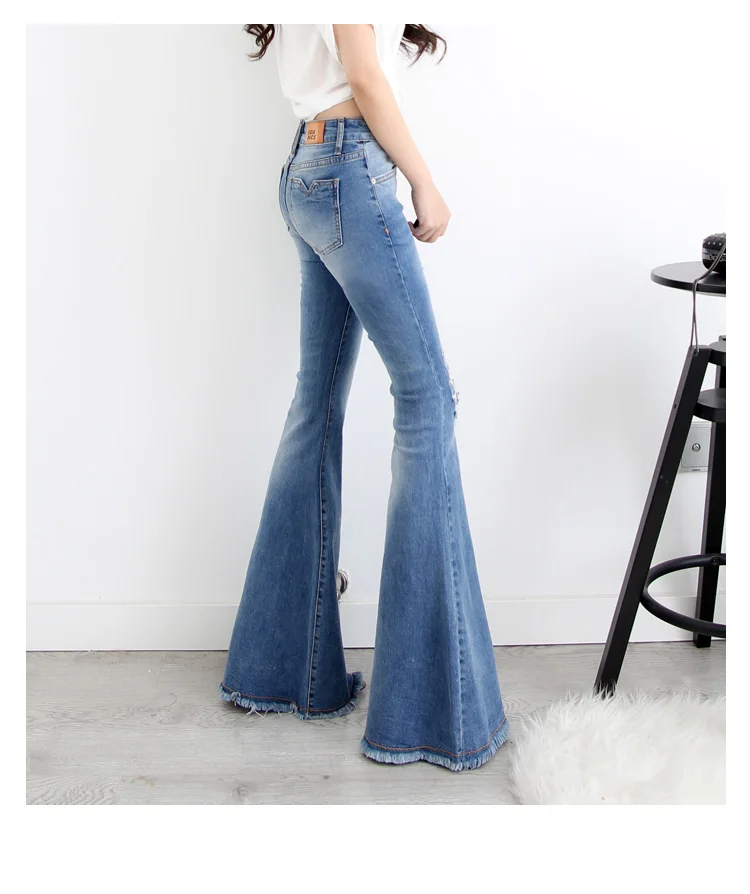 Плюс Размеры осень расклешенные джинсы Slim Для женщин длинные клеш новые рваные
