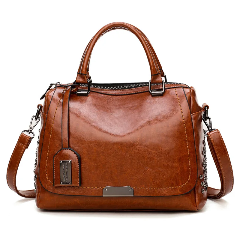 

New ladies handbag Boston bag large-capacity handbag casual rivet shoulder diagonal package pubags for women 2018 handbag NB184