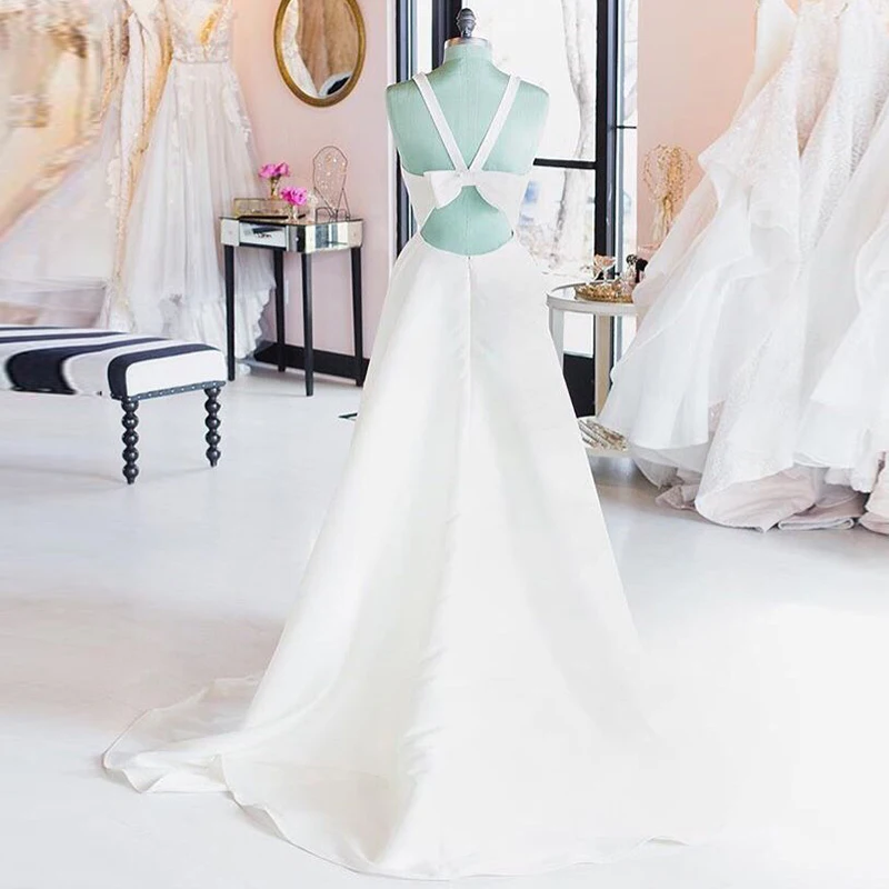 

Simple V-neck Wedding Dresses Cut-out Bow Back Sleeveless Covered Button White Ivory Sexy Beach Wedding Gown Vestido De Noiva