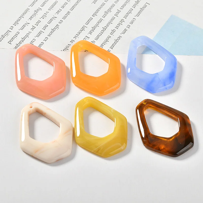 Цветные геометрические цветущие многоугольные серьги особой формы из смолы с