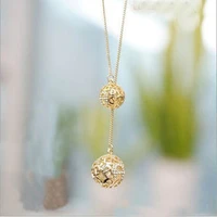 new arrival women rhinestone sweater necklace lucky hollow balls pendant long chain necklace for women fashion jewelry gifts