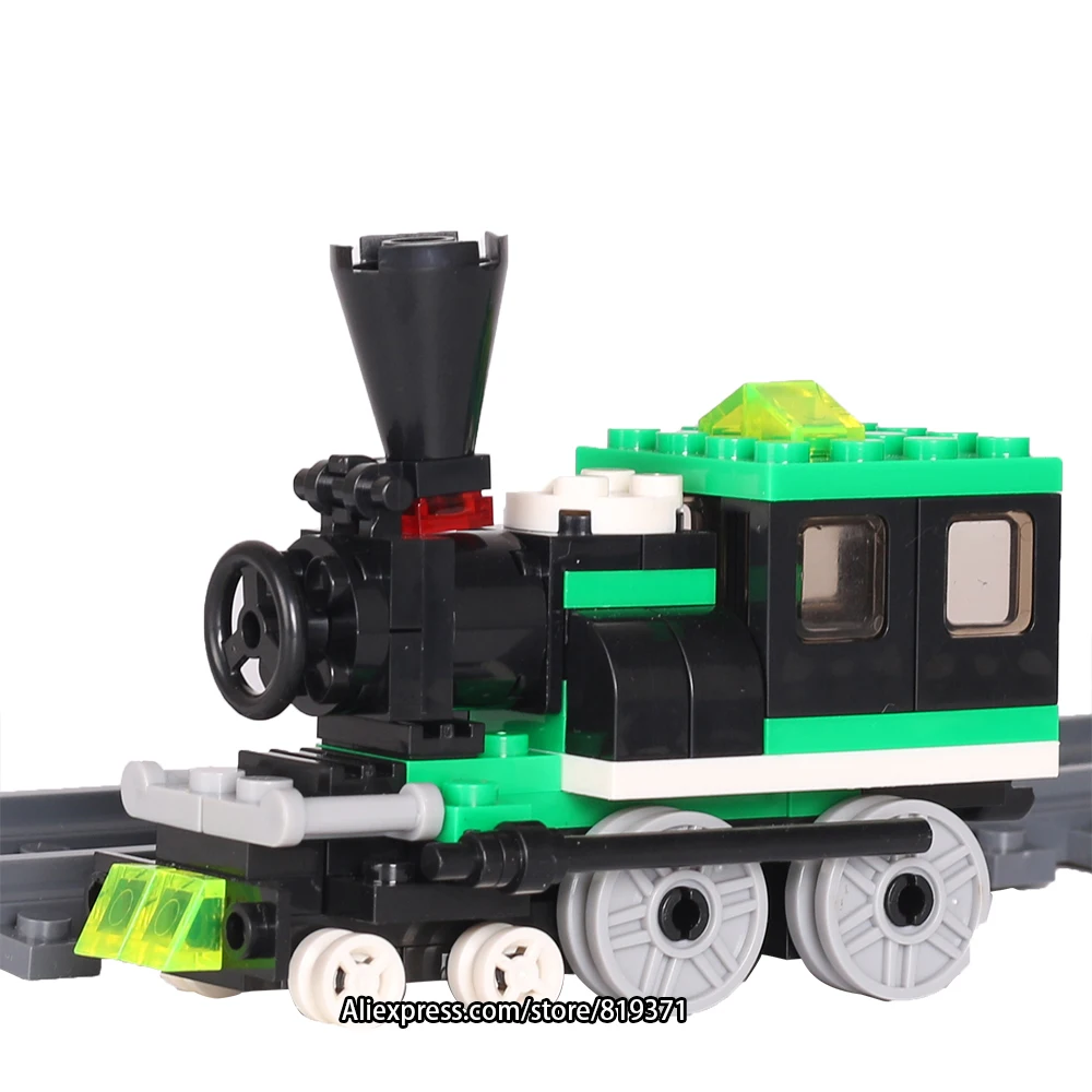 Зелёный поезд с треками строительные блоки железнодорожная транспортировка