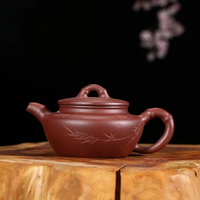 

yixing recommended undressed ore mud purple bamboo section are recommended all hand purple sand teapot tea set