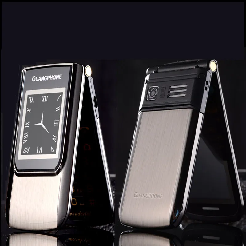 Мобильный телефон с откидным сенсорным экраном две SIM карты FM MP3 плеер SOS русская