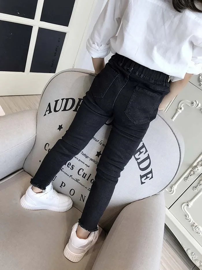 

Girl's personality hole jeans 2021 spring and autumn children's clothing wild feet pencil pants children's jeans