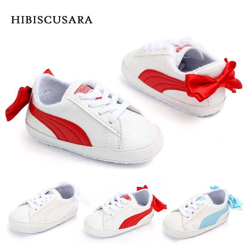 

Baby Boy Girl Classic Sports Sneakers Newborn Bebe PU Leather Non-slip First Walkers With Bow Infant Toddler Soft Sole Shoes