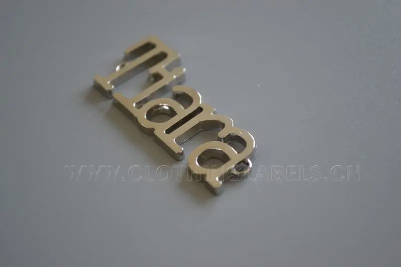 

metal labels for bag, clothing, shoes, brand clothing labels with logo shape, zinc alloy material, low MOQ, high quality.