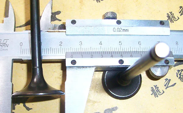 Клапан впускного клапана двигателя мотоцикла для Honda WH100 Qingqi Suzuki QS100 QS125 QS 100