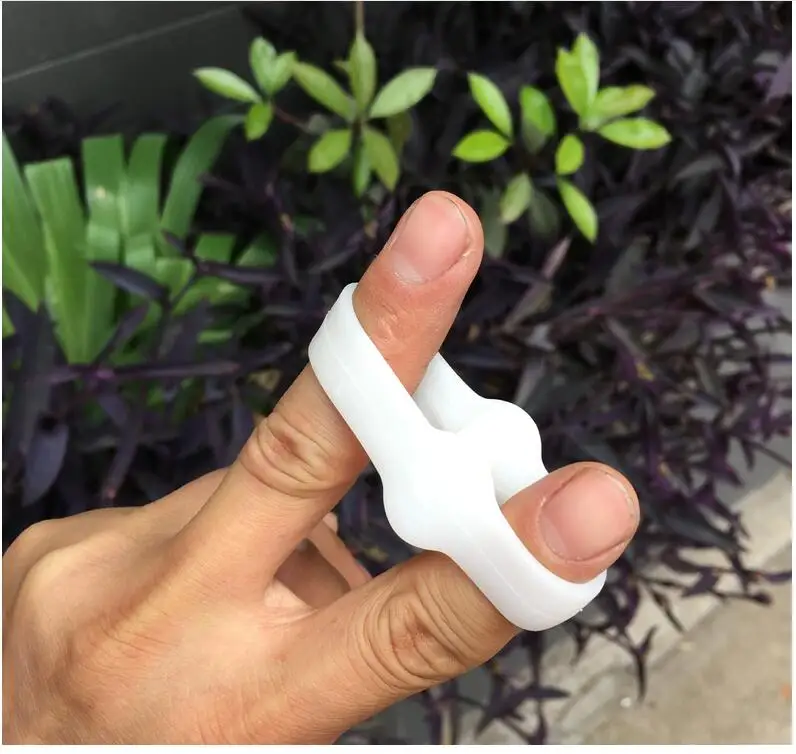 

Thumb valgus Hallux valgus Corrector Silicone toe Big toe Bone splitter Double ring toe separator