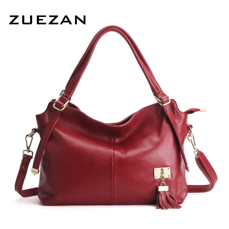 Вместительная сумка тоут из натуральной кожи с кисточками 35*27*15 см женская через