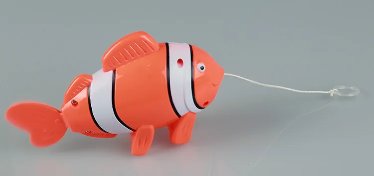 

2pcs/lot finding swim fish and boat children play in the water clockwork dabbling bath baby toy water swimming beach toys