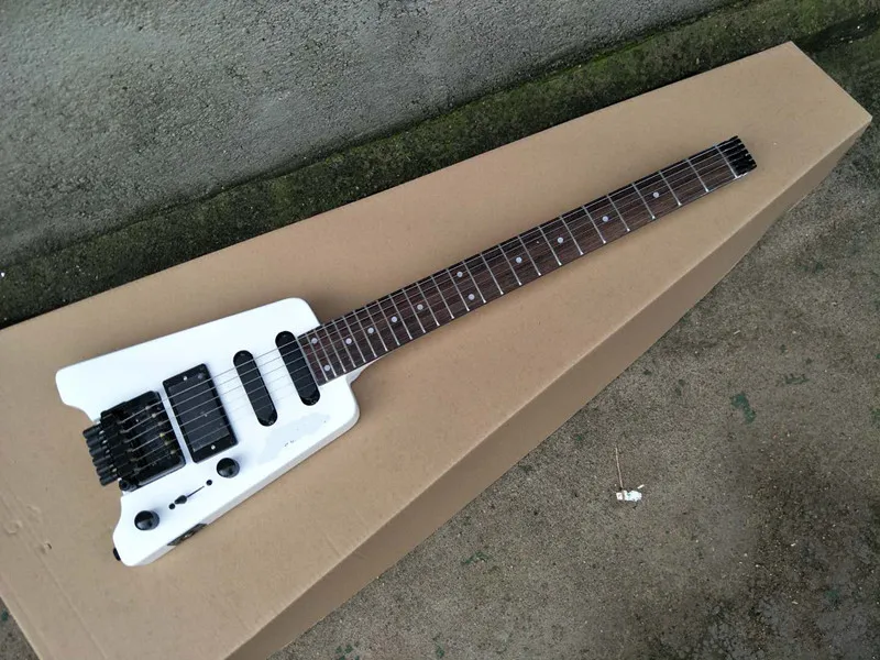 

Customized new white headless electric guitar, rose wood finger plate, black pickup, customizable, free delivery.