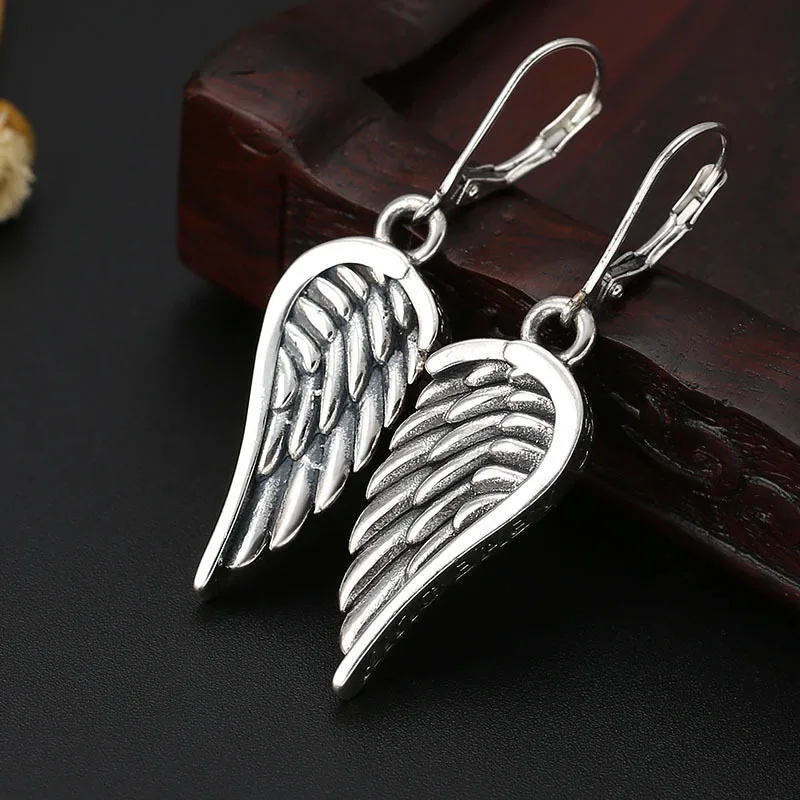 

Серьги-подвески женские из серебра 925 пробы с перьями