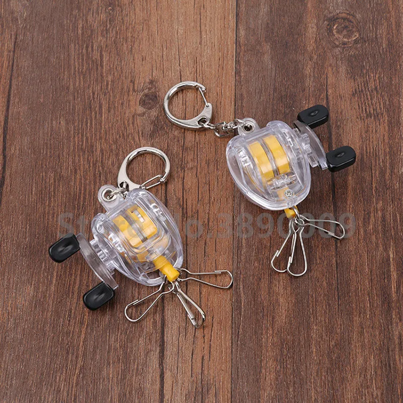 

100 Pcs Creative gold silver retractable scroll key chain fish wheel keychain fishing enthusiast metal pendant key ring