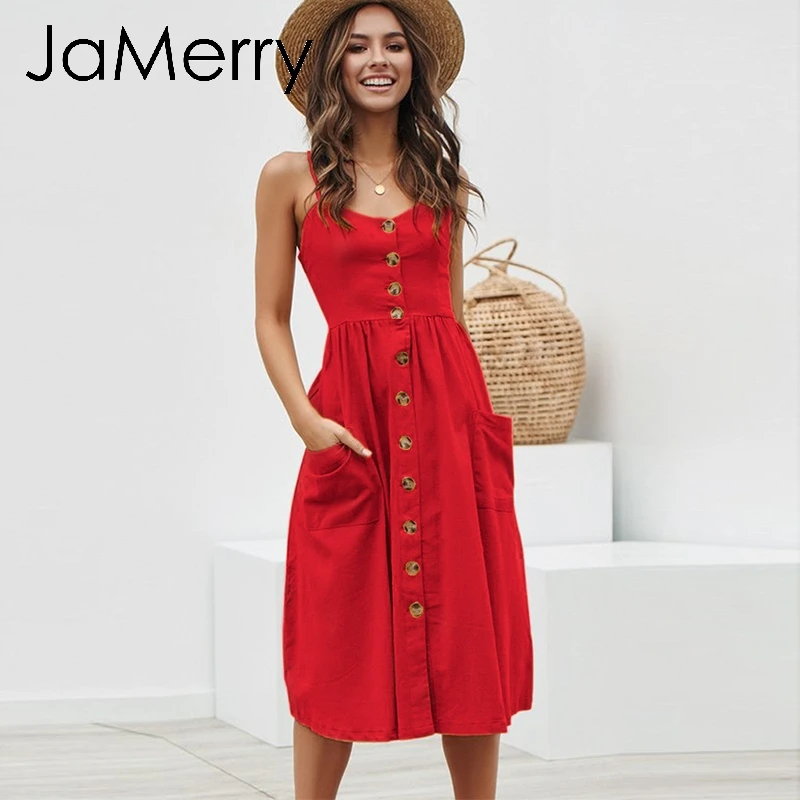 Женское винтажное платье средней длины в горошек на пуговицах с карманами и