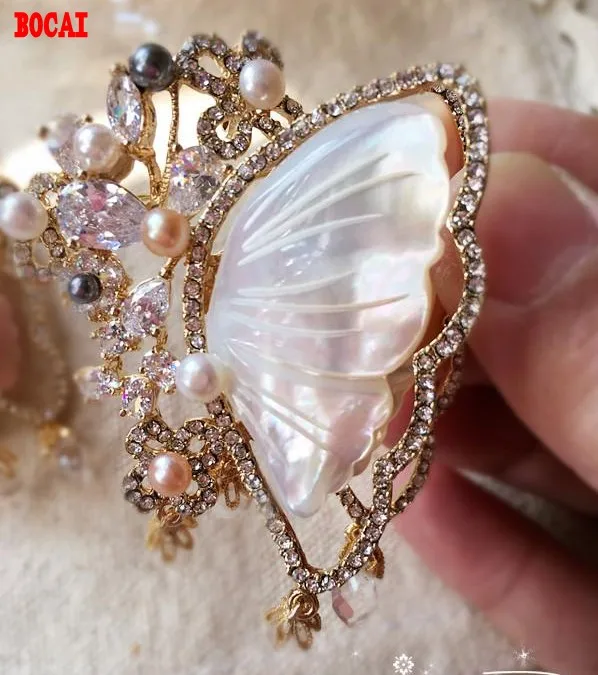 

Jinmuke South Korea imported Dongdaemun fashion noble butterfly natural pearl mother butterfly brooch brooch